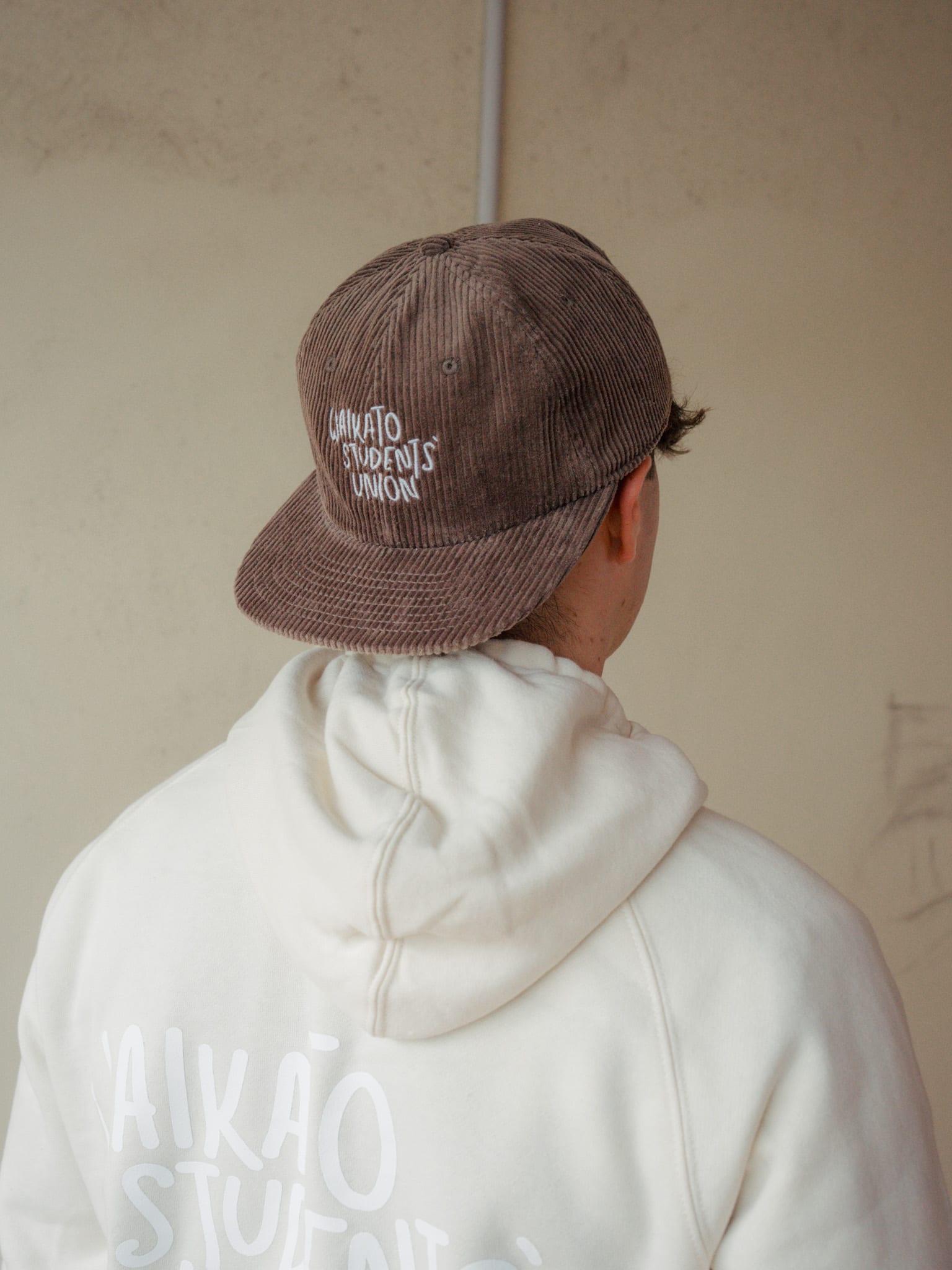 The back of the cap with the hood up